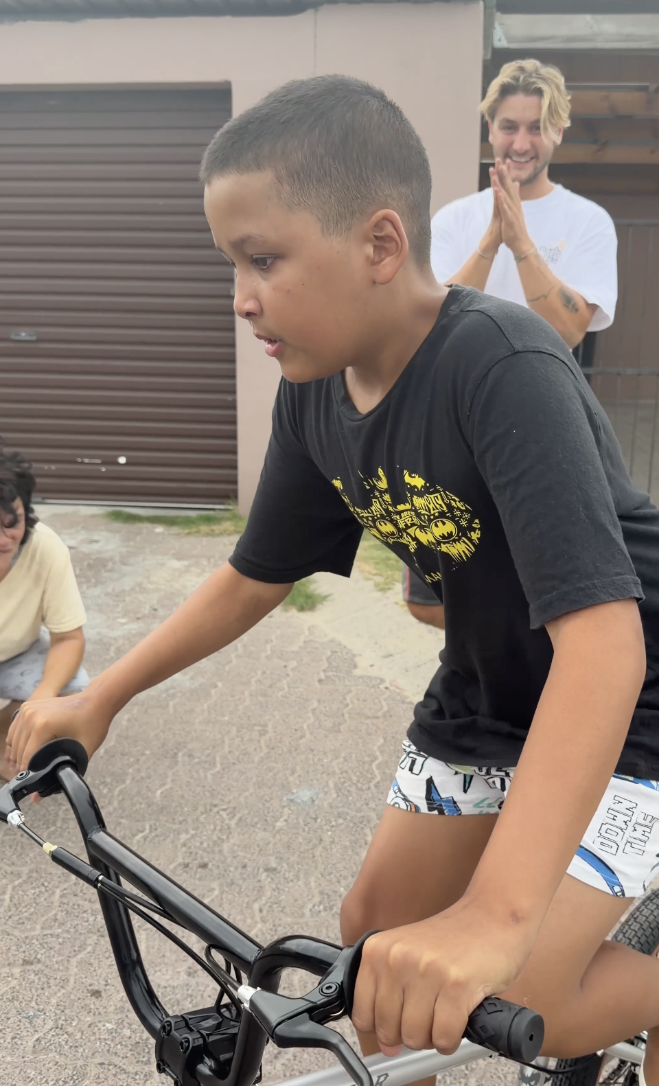 Still riding, still smiling